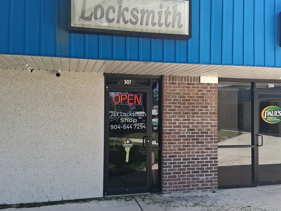 Middleburg Jax Locksmith Shop entrance marked unit 307 under the blue awning