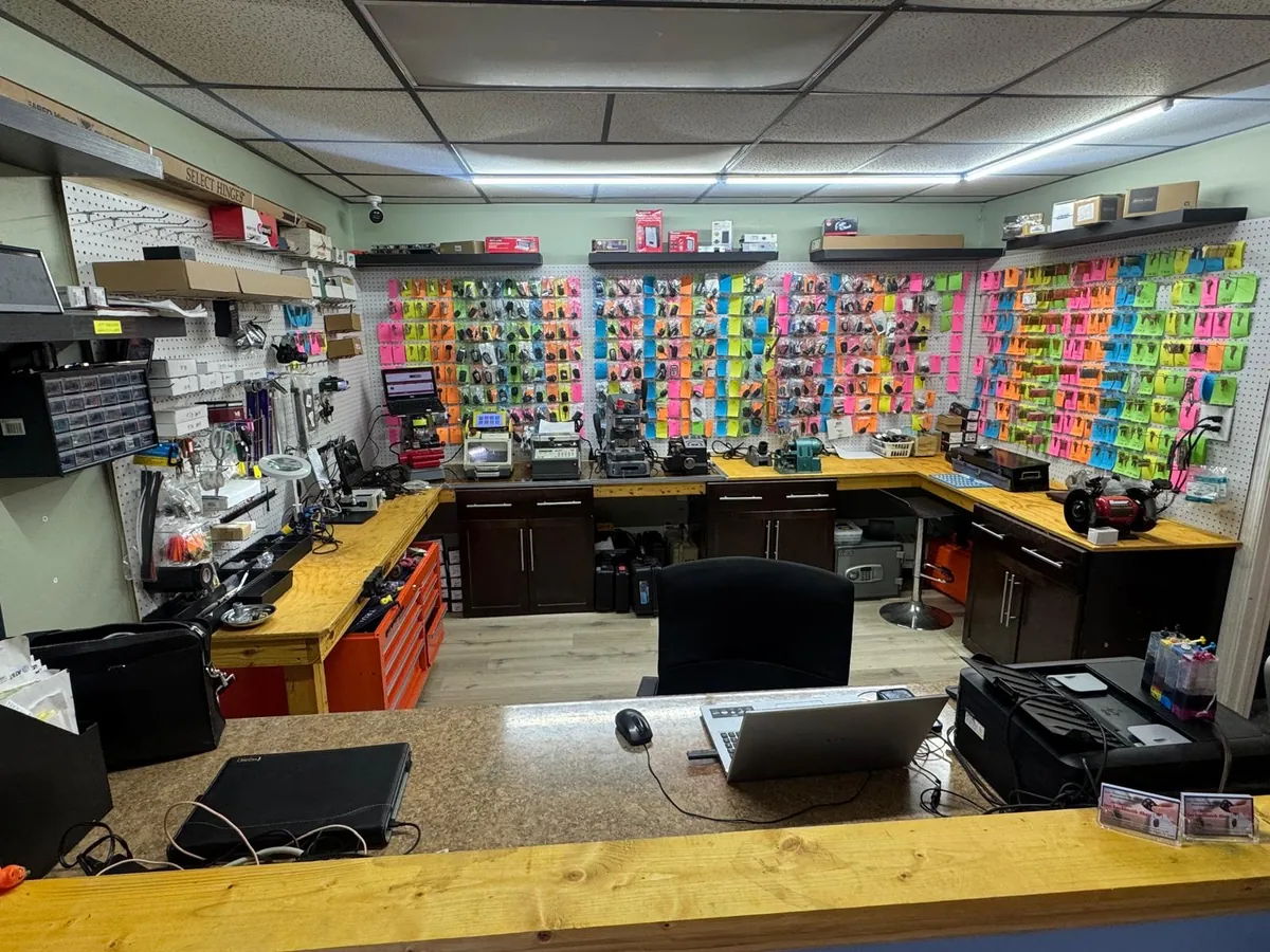 Inside our Neptune Beach locksmith shop, with key displays and key-cutting equipment